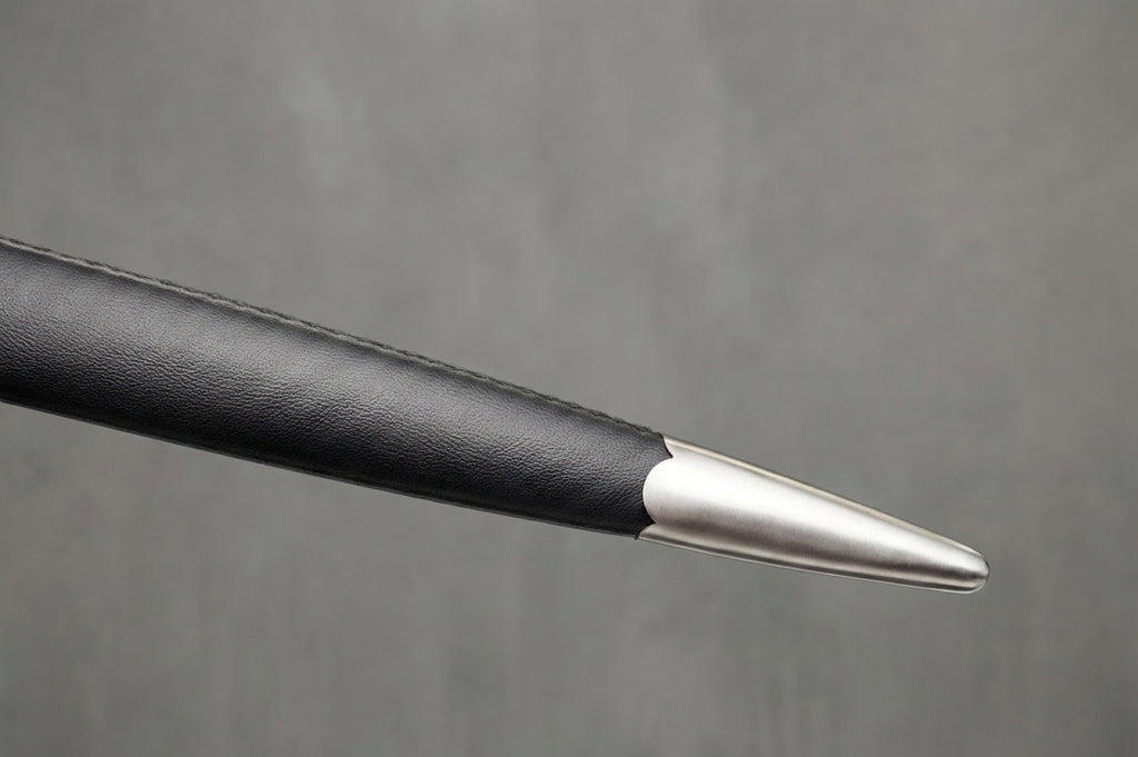Wintercross Longsword: Black leather sword scabbard with silver metal chape, stitched seam, on grey background